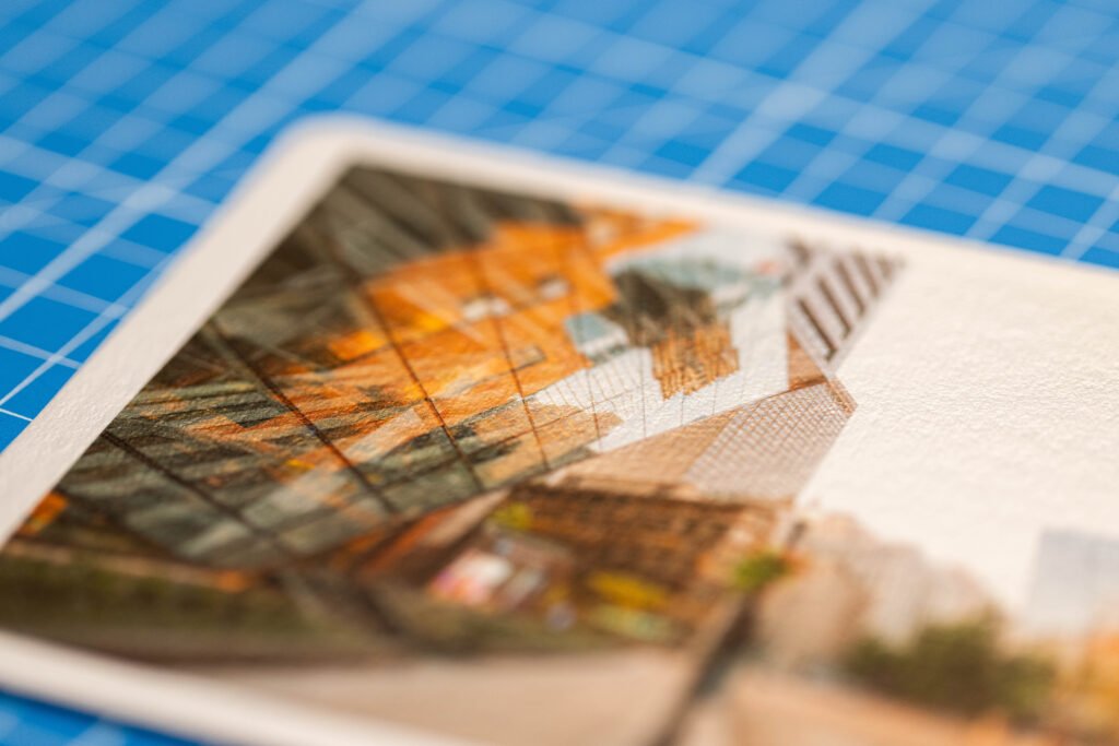 Nahaufnahme der edlen Papierkante und feinen Pigmentdruck-Details eines FineArt Kunstdrucks auf Hahnemühle Papier.